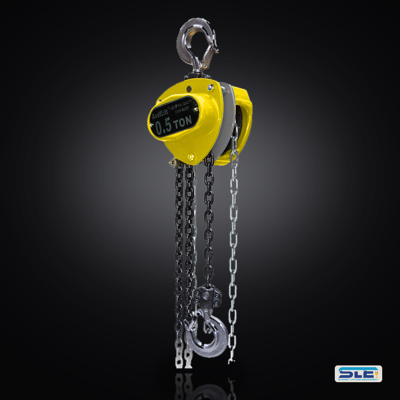 Yellow chain hoists and lifting blocks hanging on an SLE rigging store rack